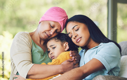 Quadro su tela Sad, hug and cancer with a family in a house for support, care and love on living room sofa