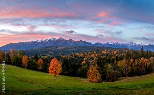 Fototapeta Naklejka Na Ścianę i Meble -  Beautiful autumn landscape in the Polish mountains. High Tatras in autumn colours at sunrise. 
