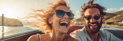 Happy smile aged couple man and woman traveling in car convertible the coast on summer sunny day. photo