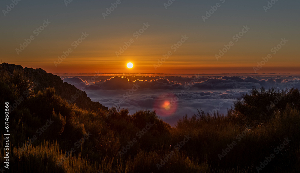 Sunset in Madeira mountains, Arieiro peak, with sea of ​​clouds