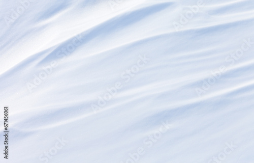 Abstract natural winter snow texture of frozen Baikal Lake in cold day. White background of snowy ice. Frozen waves or weathered snowbank. Mockup for text, copy space, blank, top view, flat lay