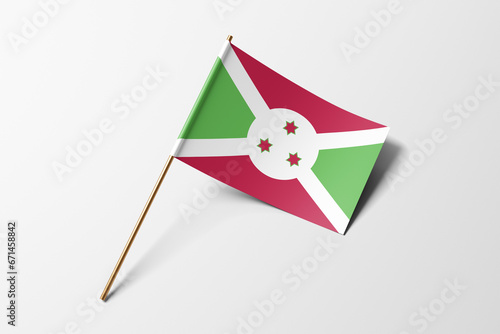 Burundi flag of small paper, isolated on white background photo