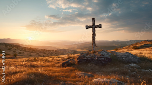 Holy concept- Old cross on mountain sunset background.