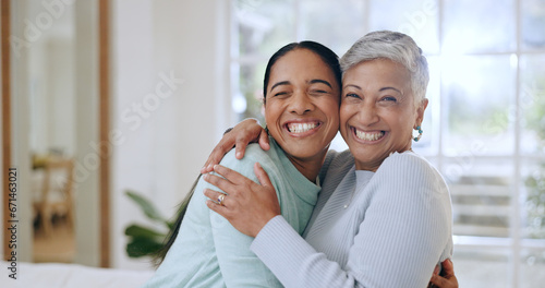 Hug, happy and portrait of mother and daughter in home for bonding, relationship and smile together. Family, love and mature mom embrace adult woman for mothers day, support and care in living room photo
