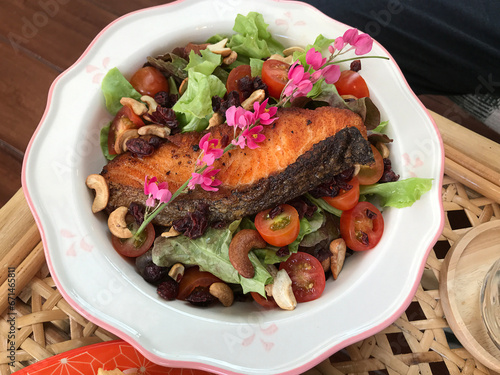 Dish of yummy Salmon salad décor with Chain of love flowers. 