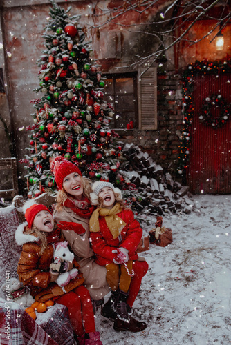 Family on red outfit on christmas new year's eve