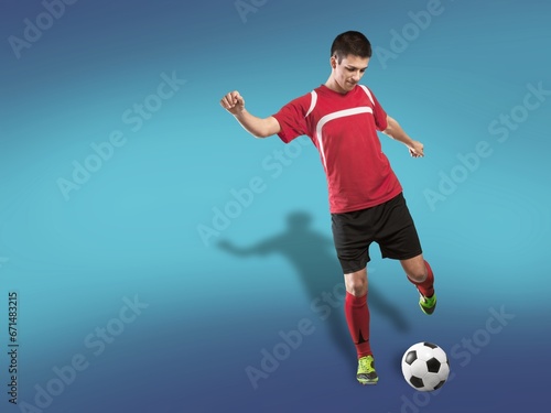 Portrait of young sporty man, a professional football player © BillionPhotos.com