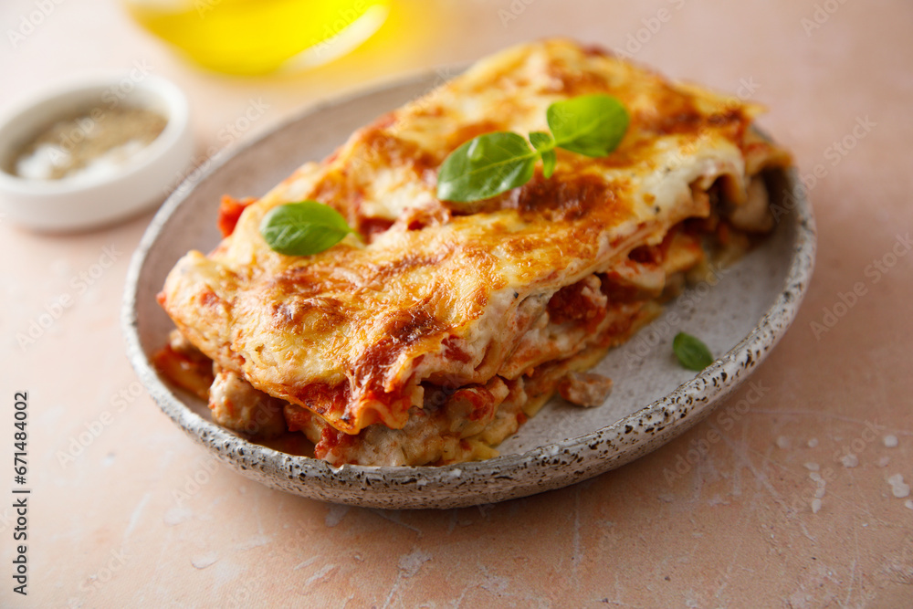 Traditional homemade lasagna with fresh basil Traditional homemade lasagna with fresh basil