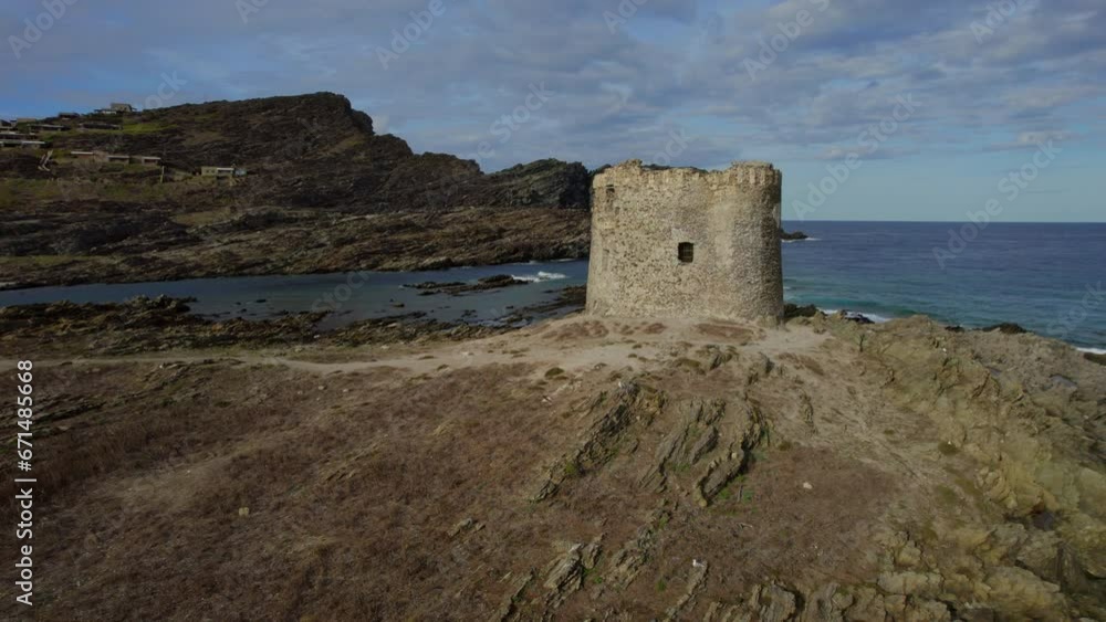 Orbital aerial view of the tower located on Isola della Pelosa, Sardinia on a sunny day. Orbital aerial view of the tower located on Isola della Pelosa, Sardinia on a sunny day.