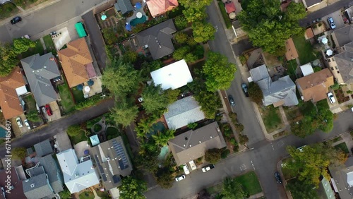 Aerial view over a neighborhood in sunny Roseville, USA - top down, drone shot photo
