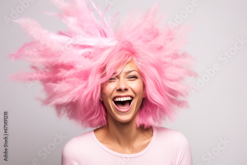 Woman with high, voluminous pink hairstyle