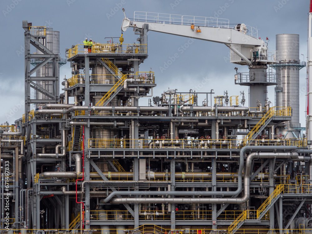 Closeup of chemical industrial pipelines of a petrochemical ship or oil rig Closeup of chemical industrial pipelines of a petrochemical ship or oil rig