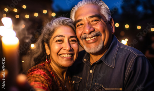 Joyful Senior Mexican Couple Capturing a Selfie at a Fiesta