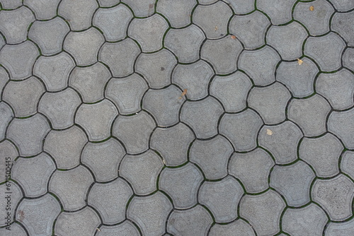 Background - rounded gray concrete interlocking paver blocks photo
