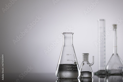 Close up of laboratory dishes and copy space on grey background