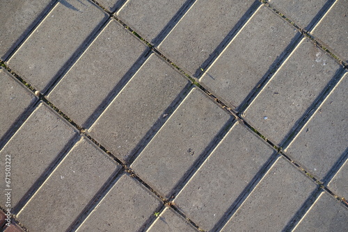 Backdrop - stack bond brick like gray concrete pavement