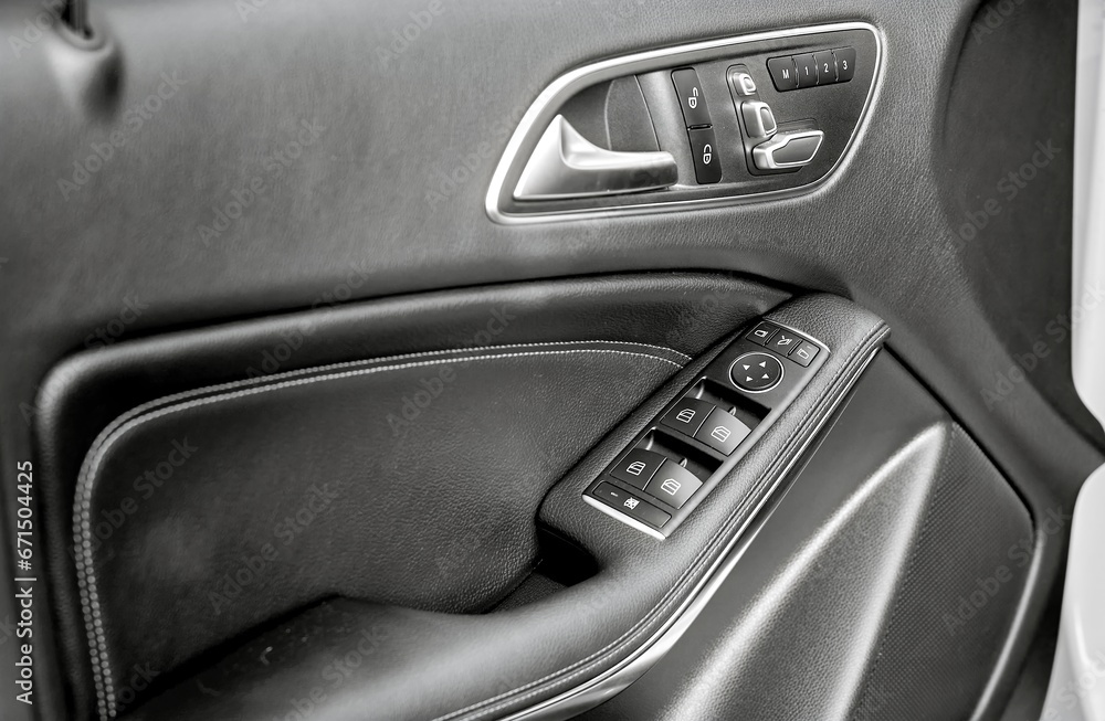 Modern city car black leather door,  inside luxury city car photo