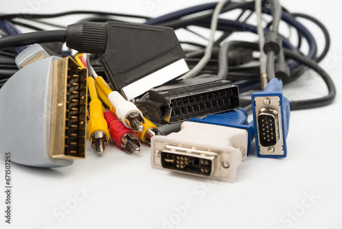 Scart and cinch electronic cables for TV and computer on a white photo
