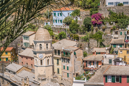 Detail of bell tower of Santa Margherita di Antiochia Church and houses in aerial view, Vernazza ITALY photo