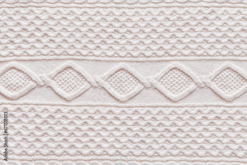 Aran sweater fabric texture background. photo