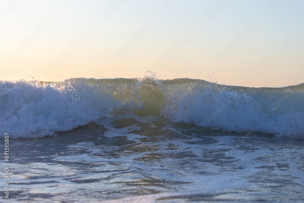 Close-up view of a breaking wave.