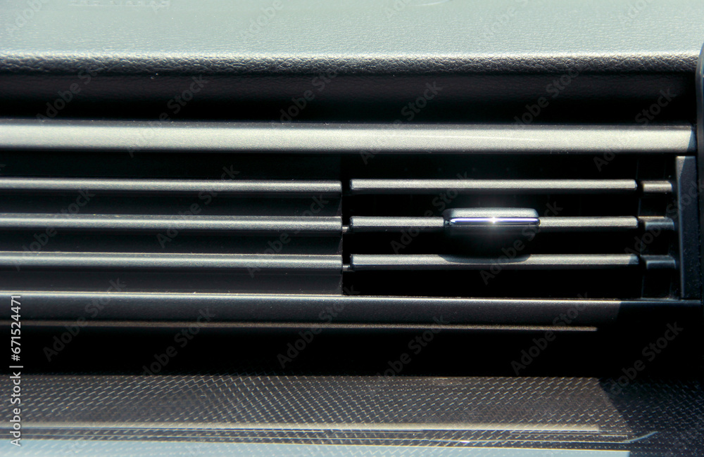 Close up of car dashboard, focused on air conditioning Close up of car dashboard, focused on air conditioning