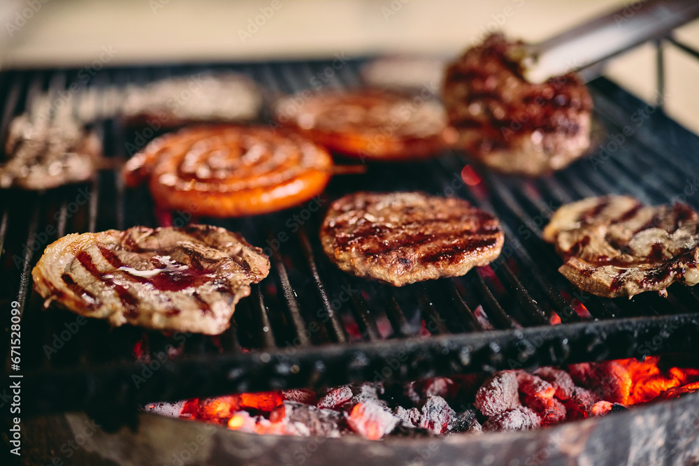 Close-up of slices of meat on the grill, delicious barbecue outdoors. Close-up of slices of meat on the grill, delicious barbecue outdoors.