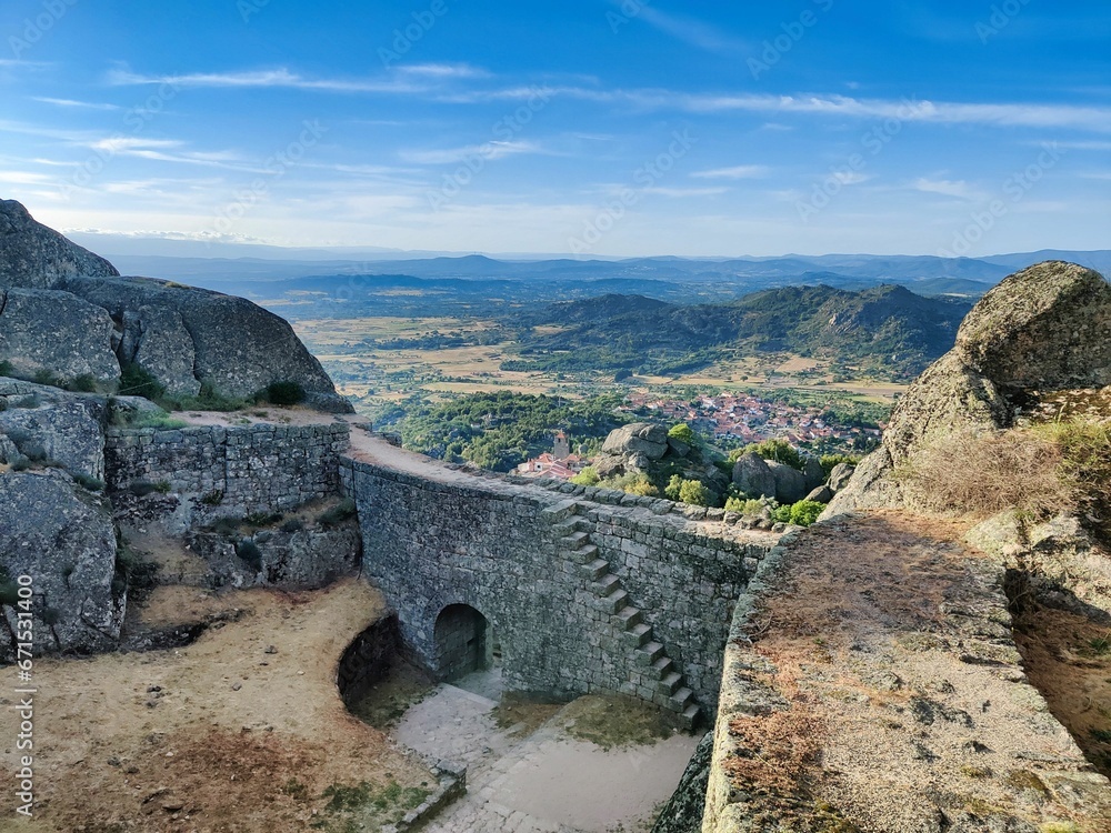 Breathtaking view of the famous Monsanto Castle in Portugal, atop a hilltop