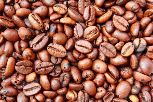 Close up roasted coffee beans background