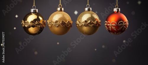 Three spheres arranged on the fir tree for Christmas decorations