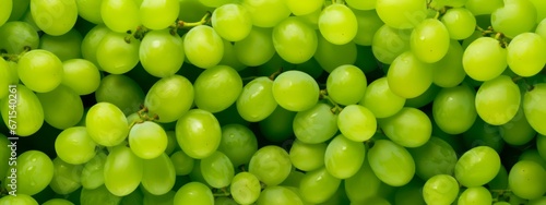 Close up of raw organic sweet green grapes background, wine grapes texture. photo