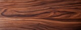 Uniform walnut wooden texture with horizontal veins. Wood background. Seamless pattern.
