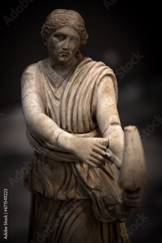 This awe-inspiring statue depicts Artemis, the Greek goddess of the hunt, in a moment of poised power.