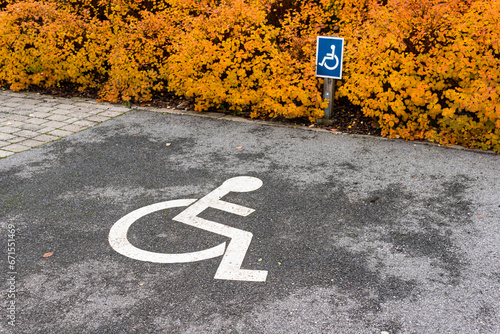 Parking for people with disabilities sign, disabled parking sign, handicapped parking sign  photo