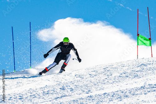 Skier on a slope in the italian alps