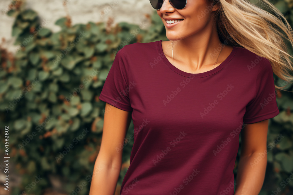 Burgundy T-Shirt Mockup, Blank Shirt Template, Casual Fashion, Woman, Girl, Female, Model, Wearing a Burgundy Tee Shirt and Sunglasses, Standing Outdoors with Plants in the Background Burgundy T-Shirt Mockup, Blank Shirt Template, Casual Fashion, Woman, Girl, Female, Model, Wearing a Burgundy Tee Shirt and Sunglasses, Standing Outdoors with Plants in the Background