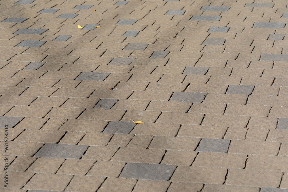 Fototapeta premium Pavement and the city. Texture, background, photo