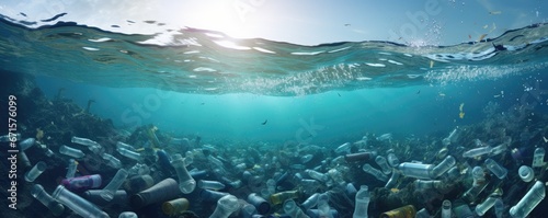 Plastic bottles and microplastics floating in the open ocean. Sea garbage in polluted water. Ecological catastrophe, environmental problem. Stop plastic pollution concept