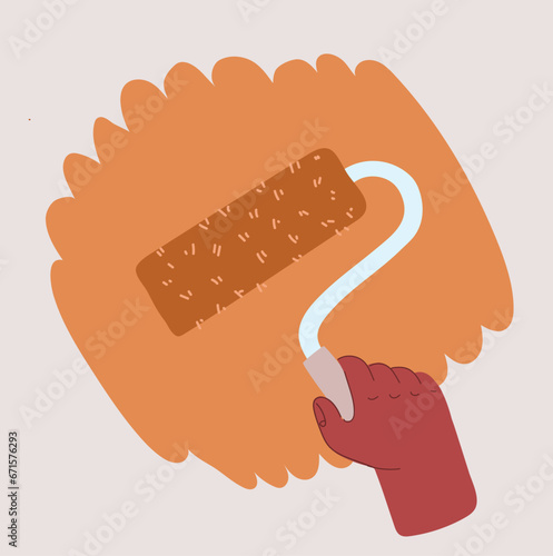 Young woman painting with paint roller on wall in apartment