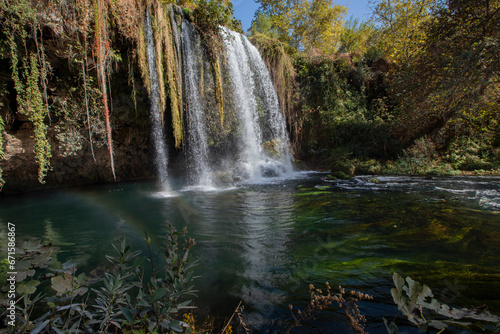 Fototapeta Naklejka Na Ścianę i Meble -  Upper Duden Waterfall is called as Alexander Falls as well and 10 km far from the city center. The paradise like hinterland of the waterfall is all in green in Antalya
