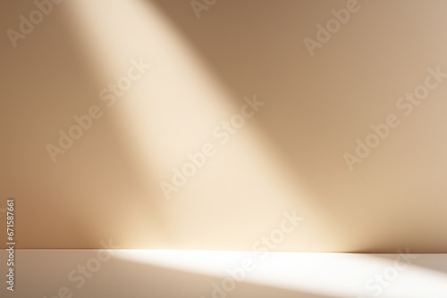 Abstract beige studio wall background for product presentation. Empty room with a light on the wall from the window. Display product with blurred backdrop.