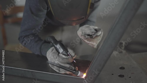 Skilled TIG Welder Crafting Precision Joints, Expert Welding Artistry in Industrial Fabrication Excellence, 4K High-Quality Footage