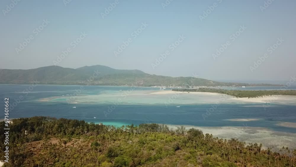 Aerial View of Serene Countryside Embracing a Beautiful Beach, a Perfect Blend of Nature's Beauty Aerial View of Serene Countryside Embracing a Beautiful Beach, a Perfect Blend of Nature's Beauty