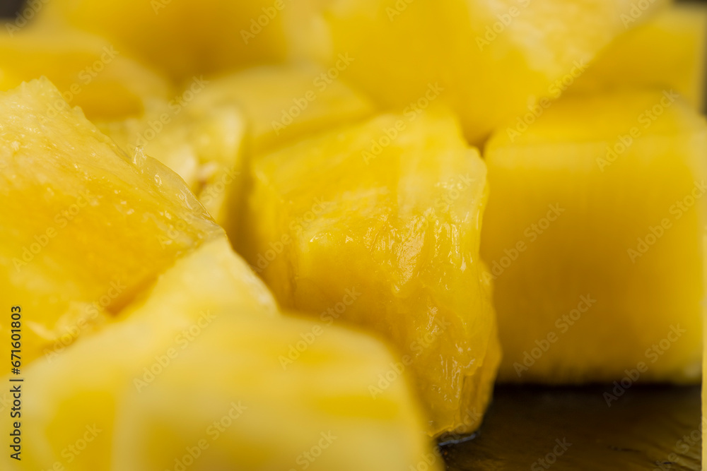 Sliced delicious ripe pineapple yellow, close up Sliced delicious ripe pineapple yellow, close up