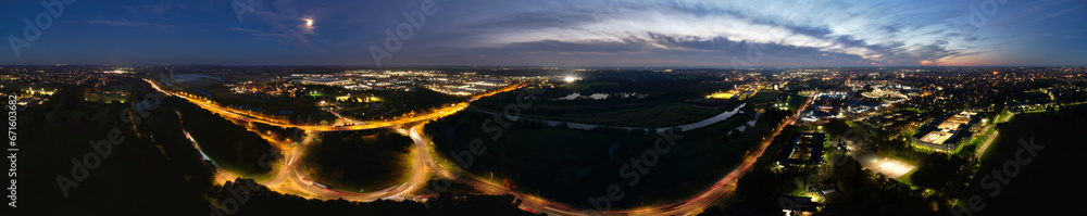 Gorgeous High Angle View of Illuminated British City at Just After Sunset Gorgeous High Angle View of Illuminated British City at Just After Sunset