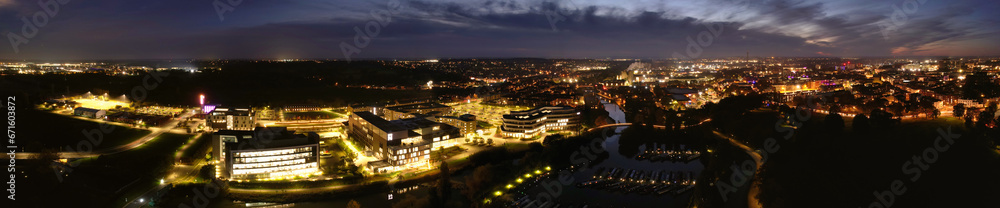 Gorgeous High Angle View of Illuminated British City at Just After Sunset Gorgeous High Angle View of Illuminated British City at Just After Sunset