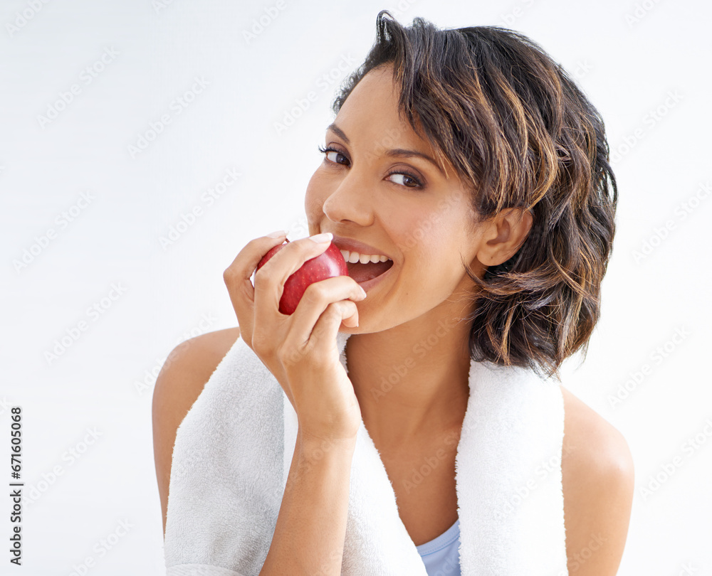 Fitness, studio and portrait of woman with apple, smile and healthy breakfast diet for weight loss. Nutrition, detox and exercise, happy face of girl eating fruit on white background for wellness. Fitness, studio and portrait of woman with apple, smile and healthy breakfast diet for weight loss. Nutrition, detox and exercise, happy face of girl eating fruit on white background for wellness.