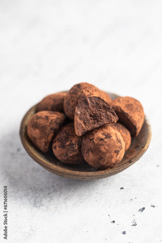 Homemade chocolate truffles with cocoa powder. Closeup view. Tasty sweet chocolate truffles Homemade chocolate truffles with cocoa powder. Closeup view. Tasty sweet chocolate truffles