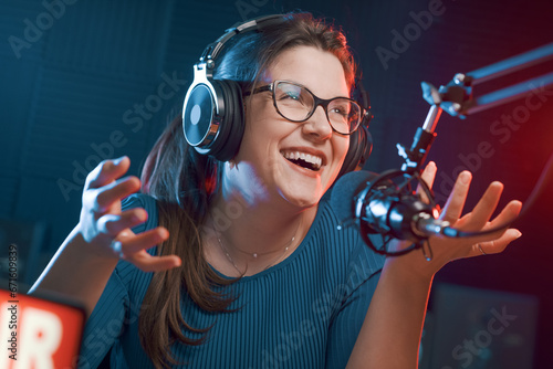 Cheerful woman hosting a radio show