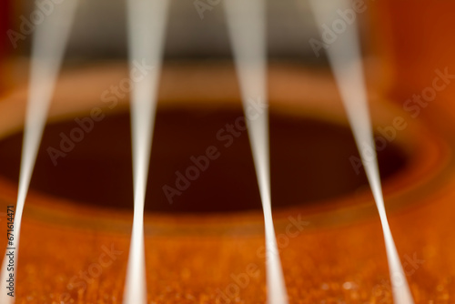 guitar string vibrating close-up, small depth of field photo